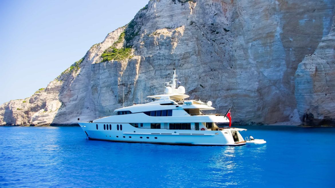 View from the top of a large white yacht at Navagio Beach.