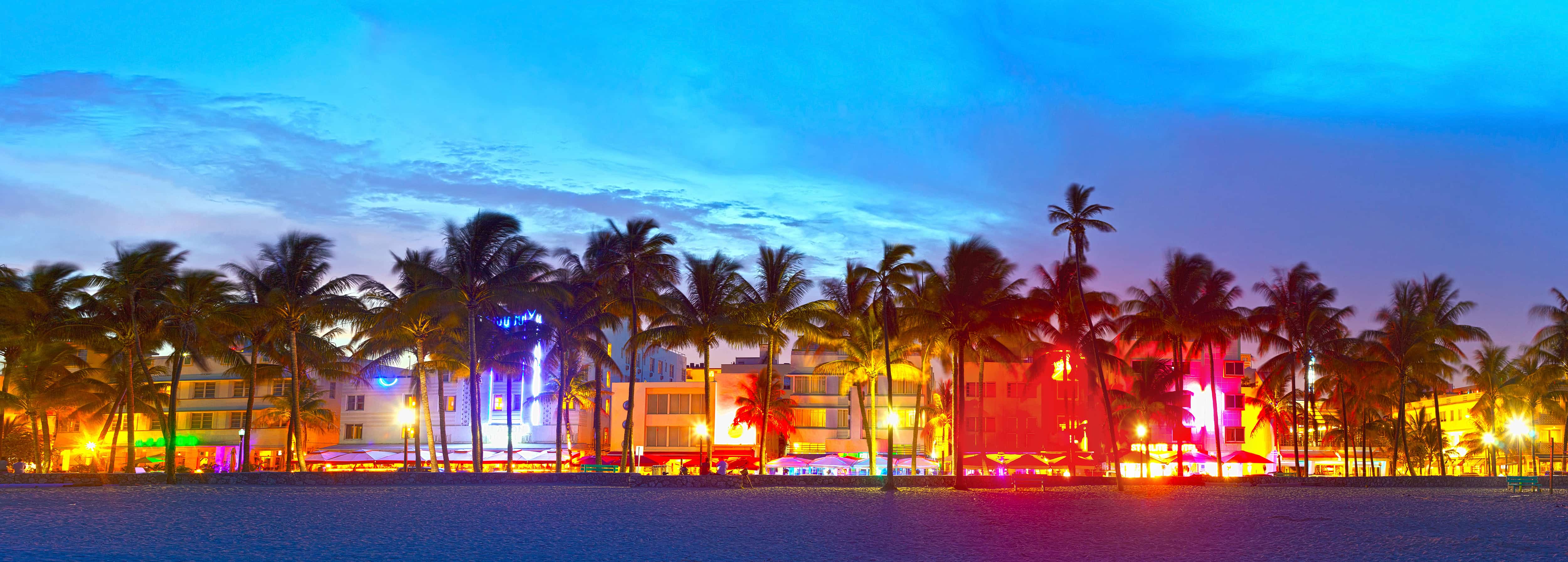 view of Miami strip at night from the water