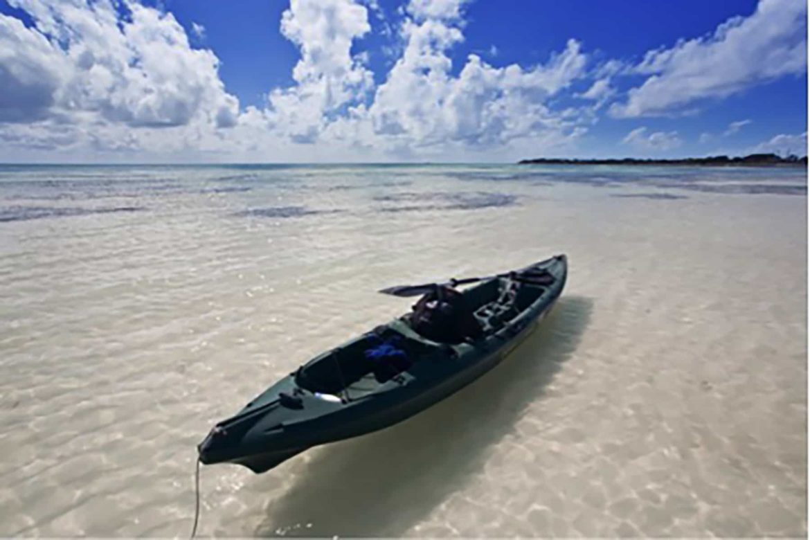 A canoe in the shallow coastal waters of Florida