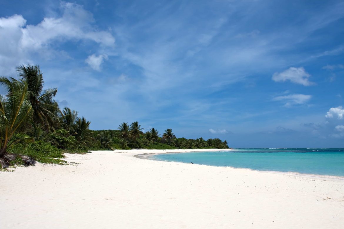 Tropical white sand beach for you to enjoy on your Spanish Virgin Island yacht charter