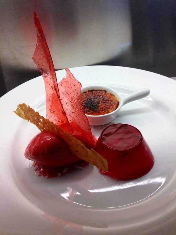 plate of 3 raspberry desserts