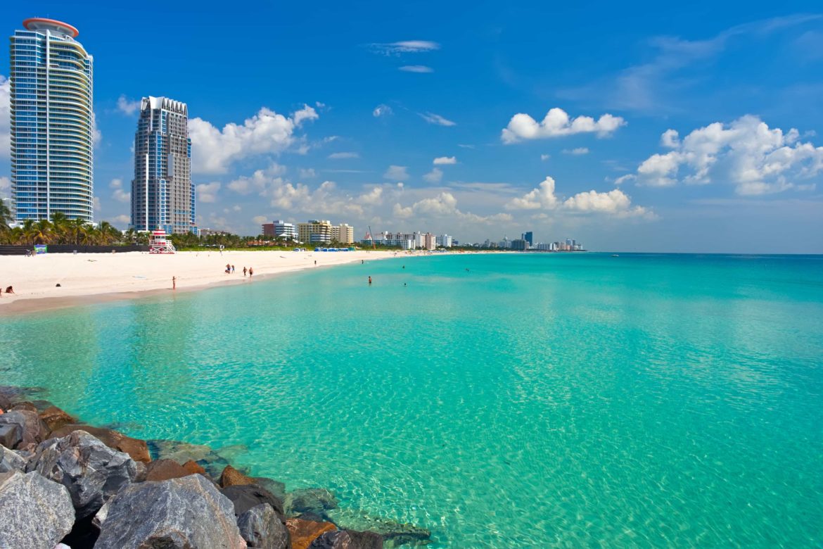 White sand beachs, aquamarine water, and skyscrapers of Miami