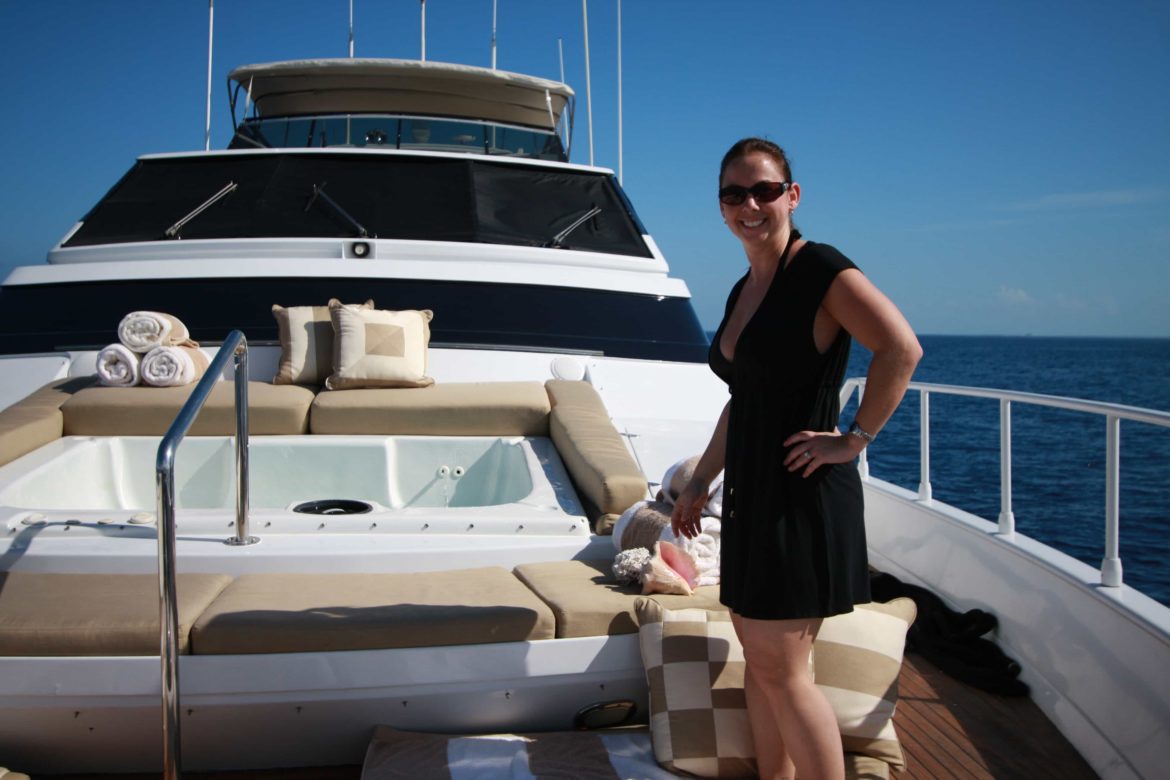 Woman enjoying her yachting vacation