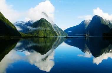 New Zealand still waters with mountains all around