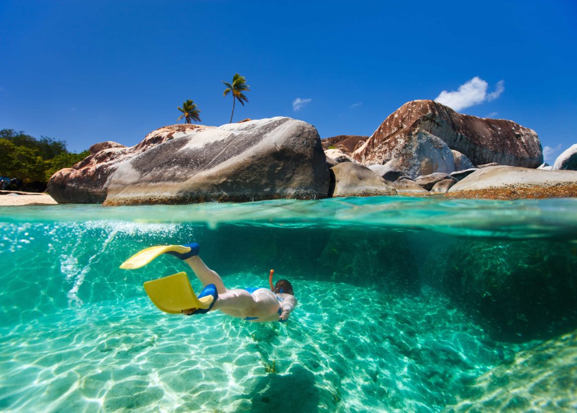 Woman snorkeling in tropical water