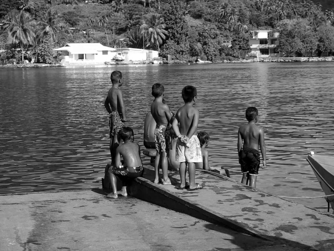 Black and white photo of local children in French Polynesia