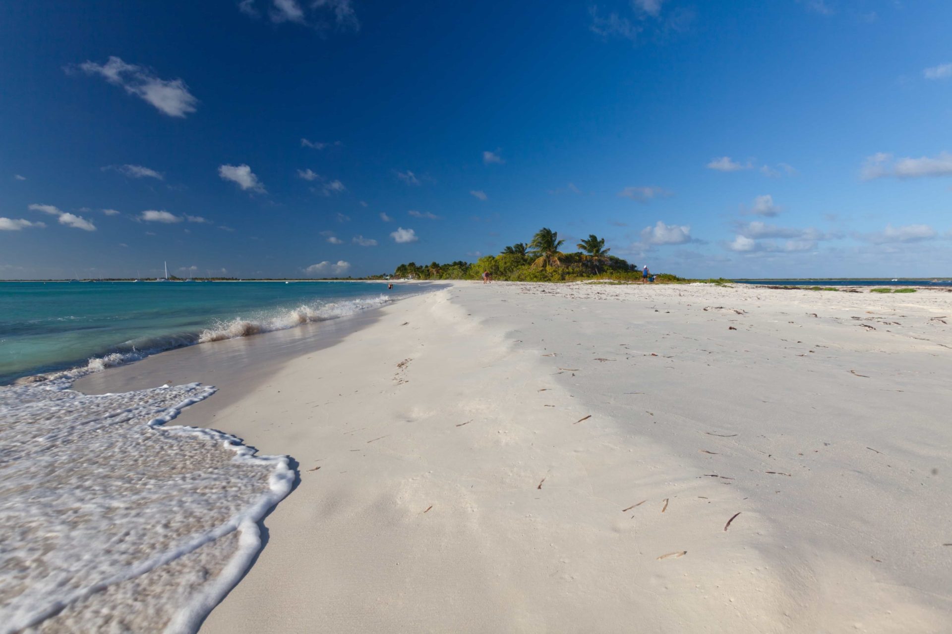 deserted white sand beach in Caribbean 