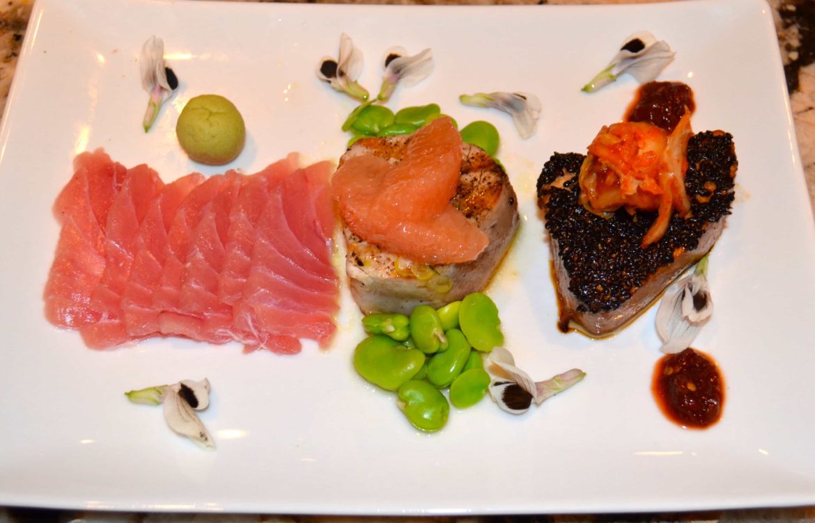 Beautifully plated seafood dinner fit for serving on a superyacht.