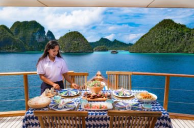 yacht stewardess onboard Rascal prepares lunch