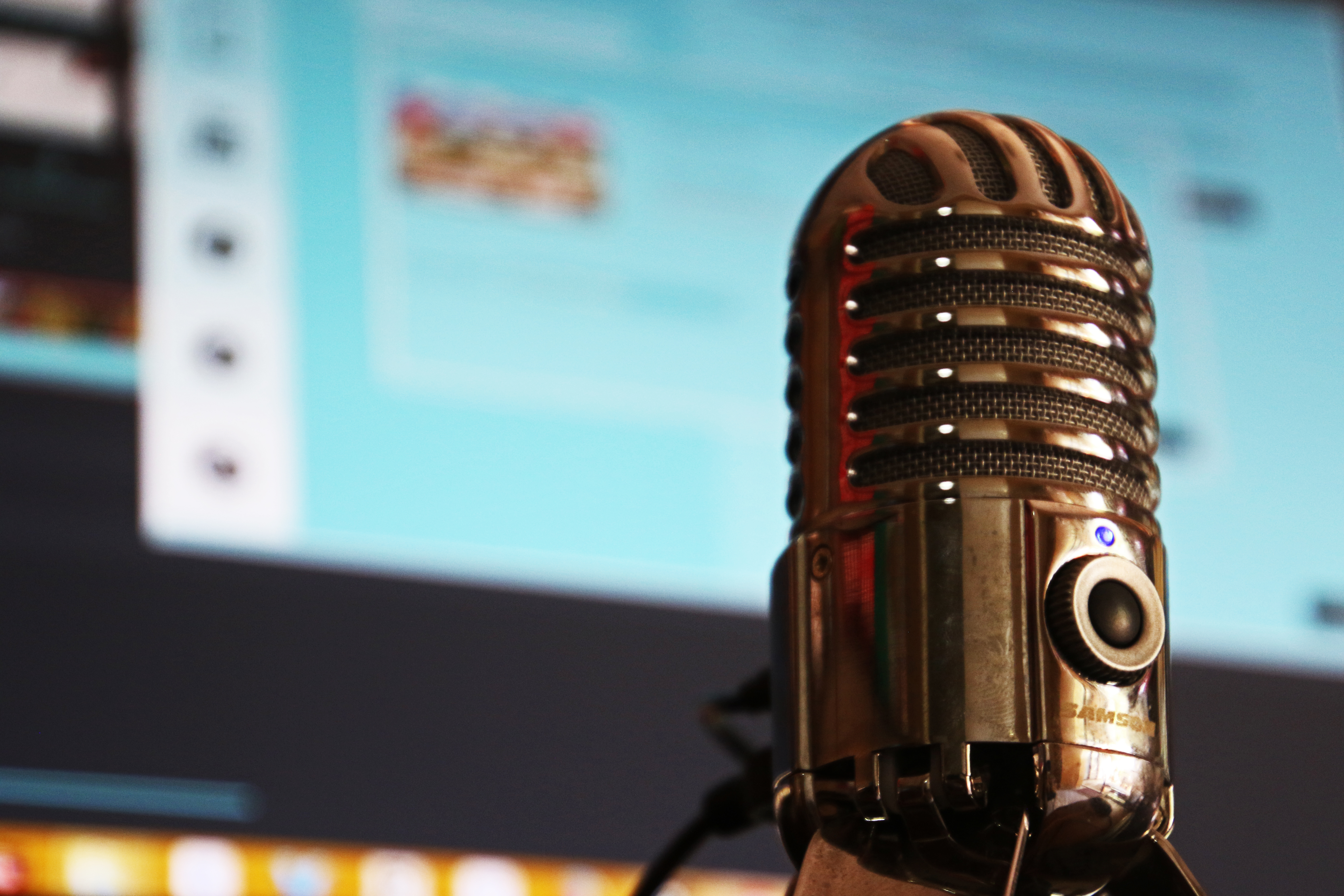 stock image of a microphone in front of a computer