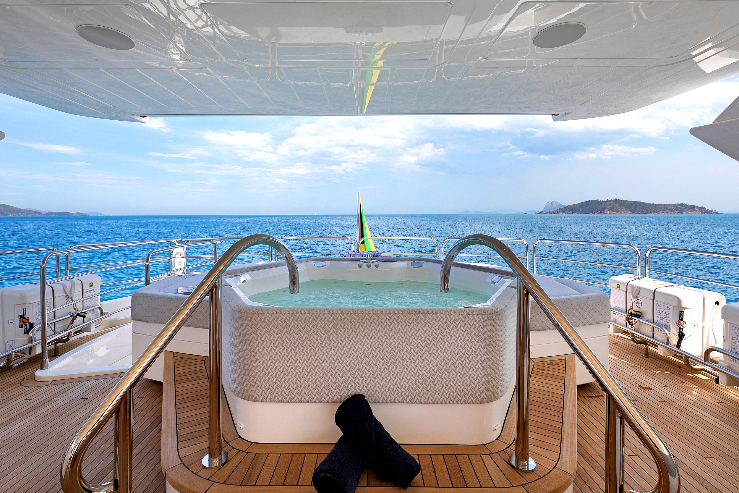 view of the jacuzzi onboard yacht Settlement with the ocean in the background