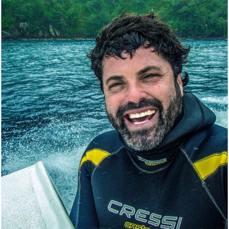 Ofer Ketter in wetsuit on boat in Costa Rica