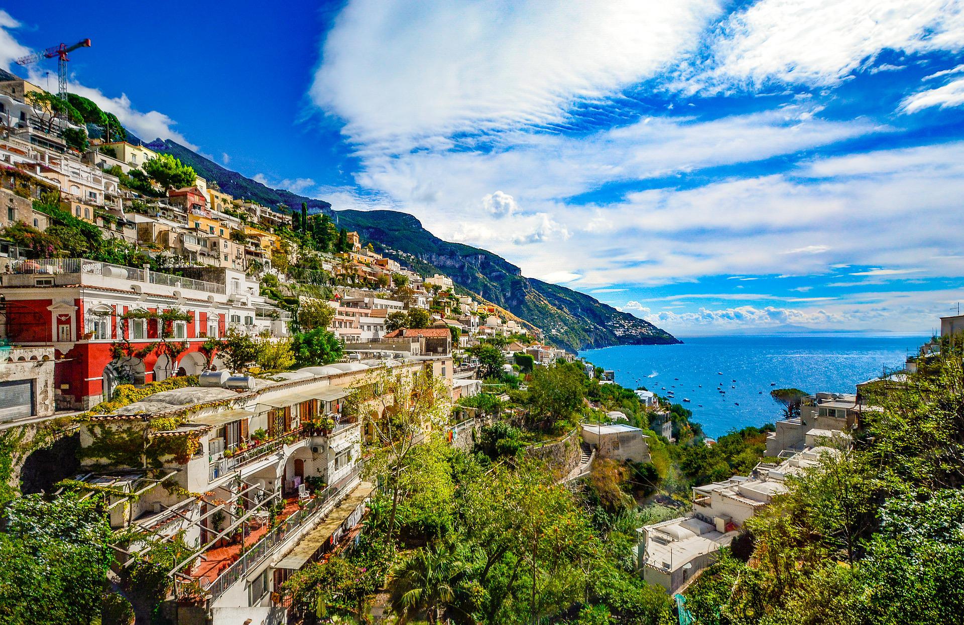 old stone houses of Amalfi coast with water in background