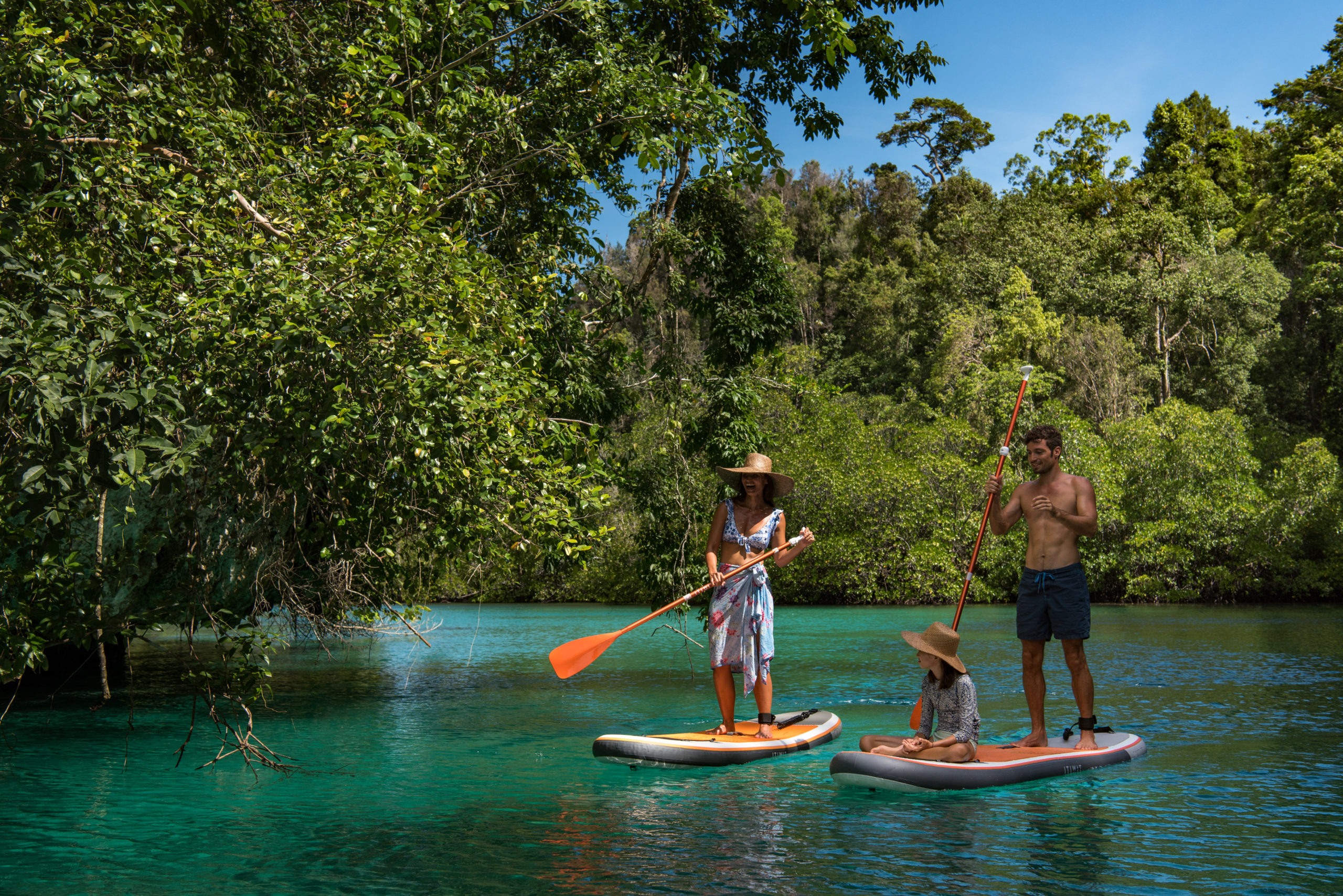 spoil mom with private paddle board around deserted islands on a superyacht vacation