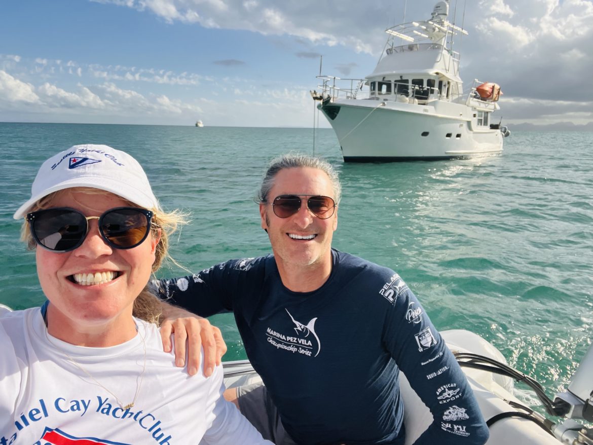 working reboatly team, Heather and Paul with their boat in the background